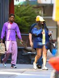 Rihanna covers her eyes with the bill of her yellow baseball cap during low-key shopping trip with baby daddy A$AP Rocky in Manhattan